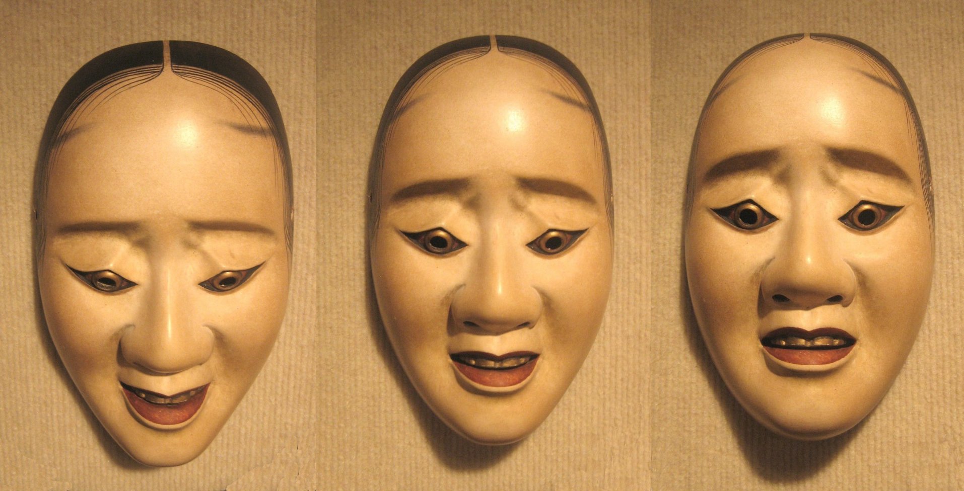 Three photographs of the same noh hawk mask, its expression changing only with the tilt of the head.